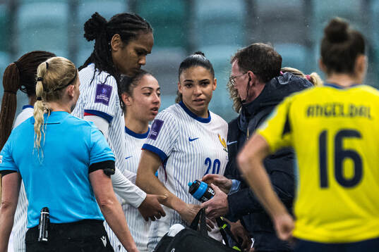 Delphine Cascarino of France in pain