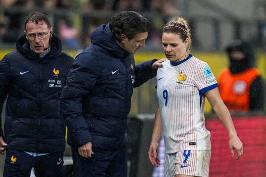 Eugénie Le Sommer of France in pain