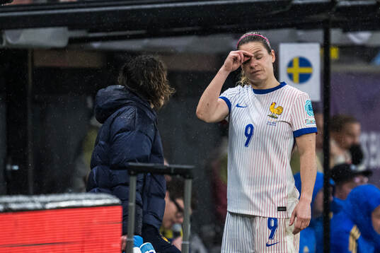 Eugénie Le Sommer of France in pain