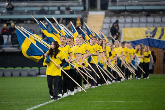 Flag bearers  ahead of the UEFA Women's Euro Qualifier football match between Sweden and France on April 9, 2024 in Gothenburg. 