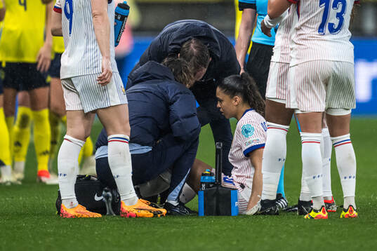 Delphine Cascarino of France in pain