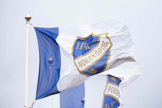Flagga med IFK Norrköpings klubbmärke