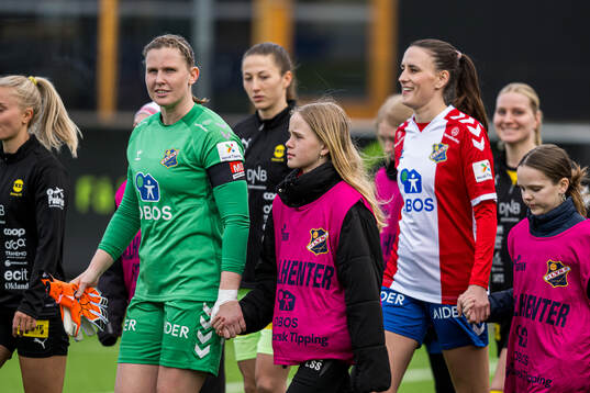 Kirvil Odden Sundsfjord and Trine Skjelstad Jensen of Lyn ahead of the Toppserien football match between Lyn and LSK Kvinner on April 19, 2024 in Oslo.