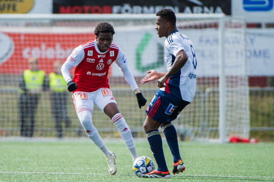 Sandvikens Calvin Kabuye och Östers Manasse Kusu