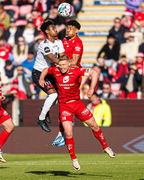Faniel Tewelde of Odd, Sivert Heltne Nilsen and Japhet Sery Larsen of Brann