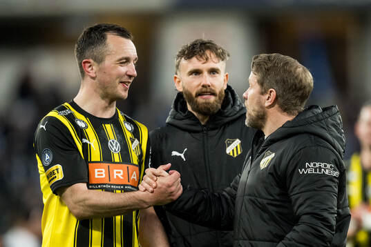 Häckens Even Hovland och tränare Pål Arne Johansen jublar