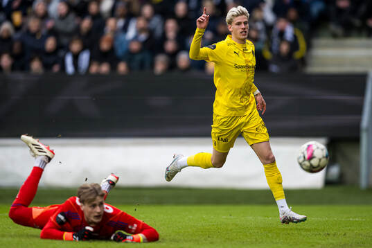 Albert Grønbæk of Bodø/Glimt celebrates after scoring the 0-3 goal behind goalkeeper Sander Tangvik of Rosenborg
