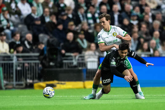 Hammarbys Hampus Skoglund och Västerås Alexander Thongla-Iad Warneryd