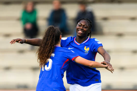 And Rachael Abedini of France celebrates