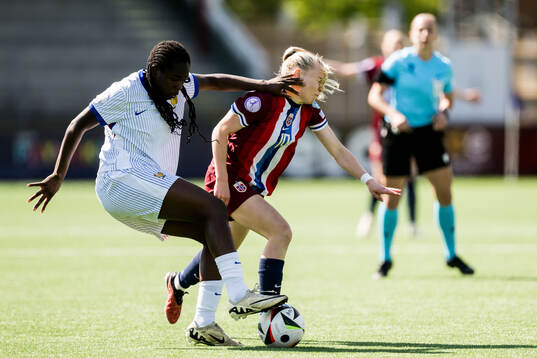 Anais Ebayilin of France and Anny Kerim-Lindland of Norway and
