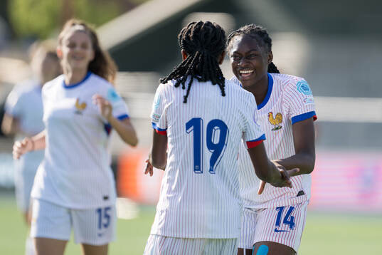 Djenna Léna Tene, Rachael Abedini, and Djenna Léna Tene of France celebrate after 0-6