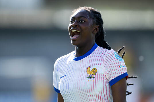 Rachael Abedini of France celebrates after scoring 0-7