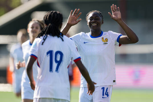 Rachael Abedini of France celebrates after scoring 0-7