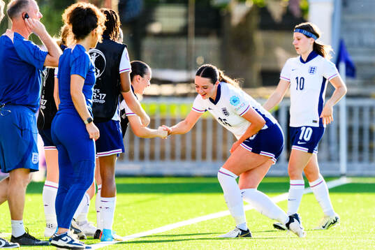 Niamh Peacock of England celebrates scoring 1-0