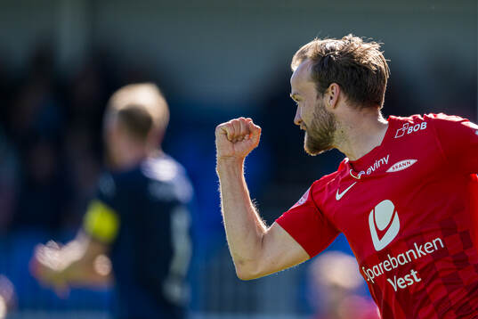 Bård Finne of Brann celebrates after scoring the 1-1 goal