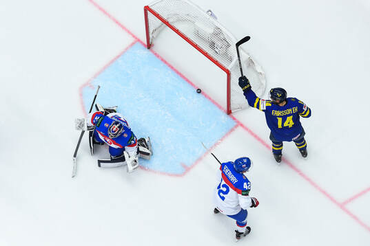 Joel Eriksson Ek of Sweden celebrates the 1-0 goal by Lucas