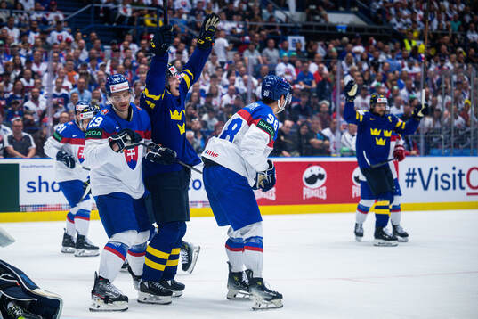 Pontus Holmberg and Erik Karlsson of Sweden celebrates the