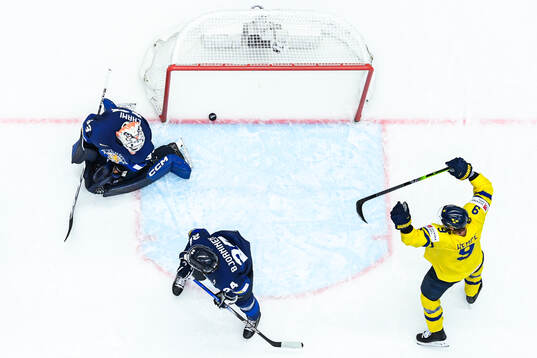 Rasmus Dahlin of Sweden (not in frame) scores 1-0 behind