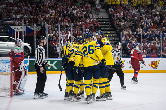 Joel Eriksson Ek of Sweden celebrates with team mates