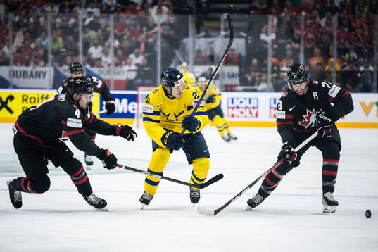 Bowen Byram of Canada, Pontus Holmberg of Sweden and Damon