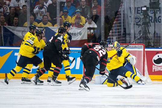 Dylan Cozens of Canada scores 1-1