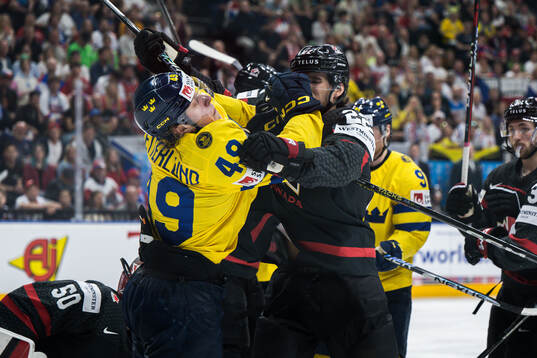 Fabian Zetterlund of Sweden and Dylan Cozens of Canada