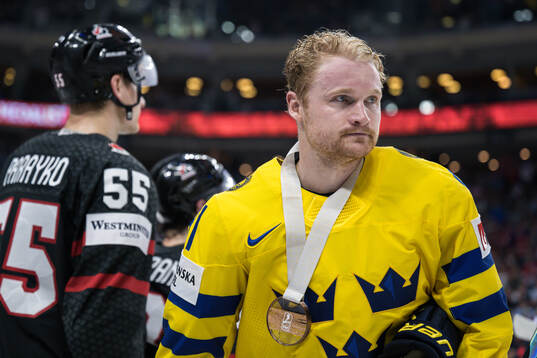 Carl Grundström of Sweden with bronze medal