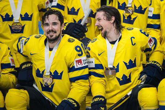 Marcus Johansson, Erik Karlsson of Sweden celebrates with