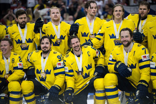 Erik Karlsson, Victor Hedman and Marcus Johansson of Sweden