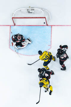 Marcus Johansson and Fabian Zetterlund of Sweden sees Erik