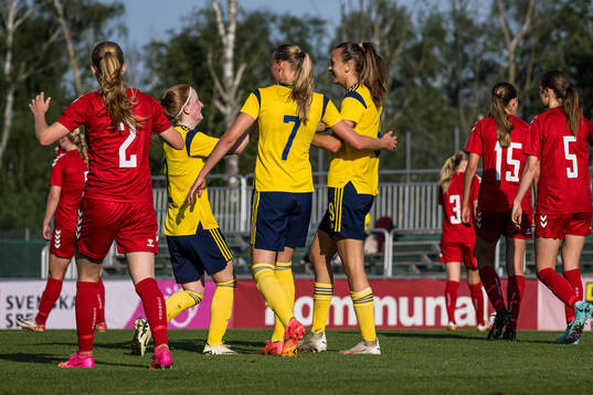 Vera Andersson, Lykke Ihrfelt and Bianca Hultbäck Nattland of Sweden celebrates after 3-1