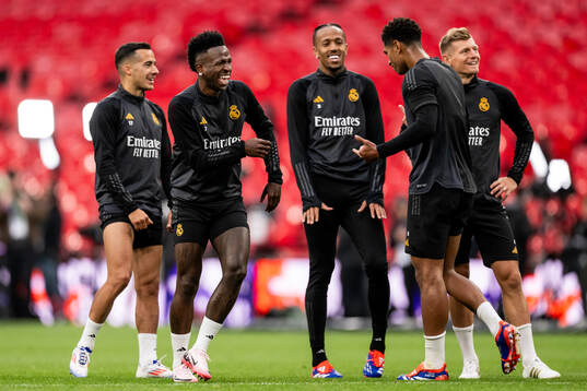 Lucas Vazquez, Vinicius Junior, Eder Militao, Jude Bellingham and Toni Kroos of Real Madrid