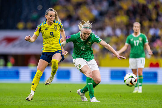 Kosovare Asllani of Sweden and Louise Quinn of Republic of