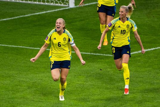 Magdalena Eriksson and Sofia Jakobsson of Sweden celebrate after 1-0