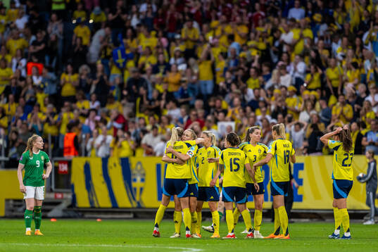 Sofia Jakobsson and Magdalena Eriksson of Sweden celebrate