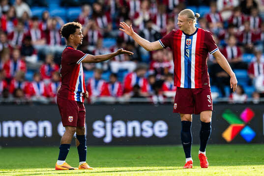 Oscar Bobb and Erling Braut Haaland of Norway