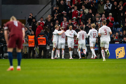 Yussuf Poulsen of Denmark celebrate with teammates