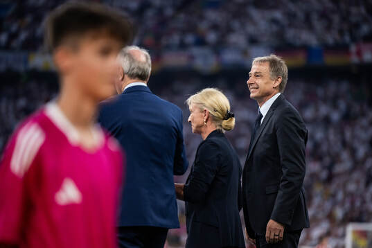 Heidi Beckenbauer and Jürgen Klinsmann honour the late Franz Beckenbauer ahead of the UEFA Euro 2024 Football Championship match between Germany and Scotland on June 14, 2024 in Munich. 