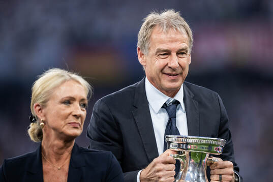 Heidi Beckenbauer and Jürgen Klinsmann with the Henri