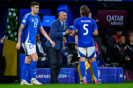Head coach Luciano Spalletti and Riccardo Calafiori of Italy
