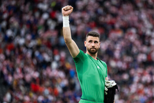 Goalkeeper Unai Simon Mendibil of Spain celebrates