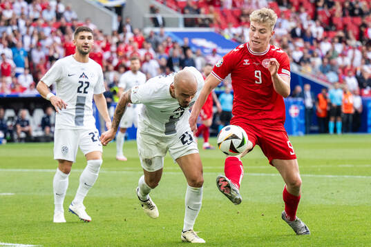 Vanja Drkusic of Slovenia and Rasmus Højlund of Denmark