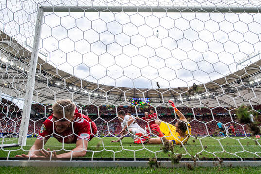 Rasmus Højlund of Denmark against Jaka Bijol and