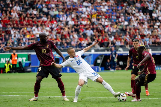 Romelu Lukaku of Belgium and Stanislav Lobotka of Slovakia