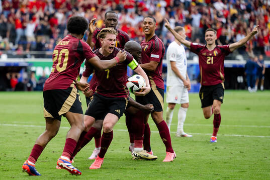 Kevin De Bruyne and Romelu Lukaku of Belgium celebrate a goal that was later disallowed