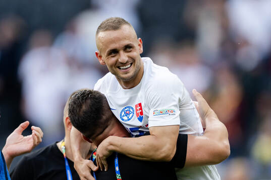 Stanislav Lobotka of Slovakia celebrates