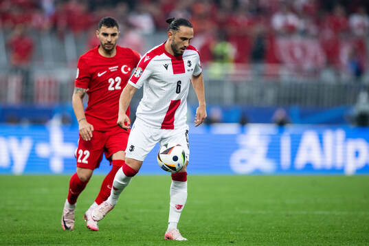 Kaan Ayhan of Türkiye and Giorgi Kochorashvili of Georgia