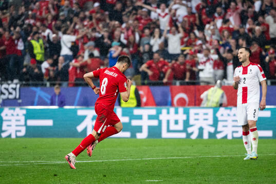 Arda Guler of Türkiye celebrates after 2-1