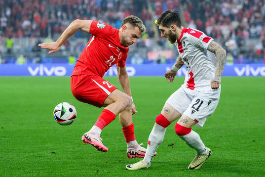 Baris Alper Yilmaz of Türkiye and Giorgi Tsitaishvili of Georgia