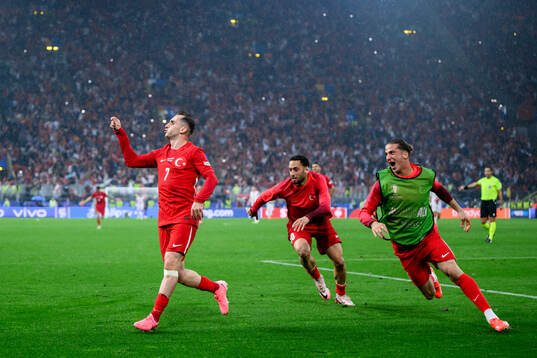 Kerem Akturkoglu of Türkiye celebrates after scoring 3-1